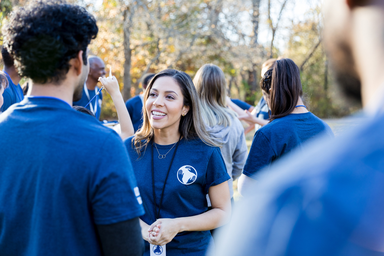 Diverse friends volunteer during community event